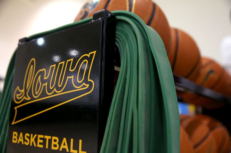 Basketballs sit on a rack during an Iowa men's basketball practice Monday, July 8, 2024 in Iowa City, Iowa.