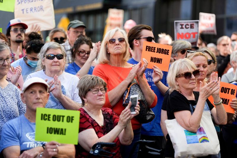 Community members rally to decry the arrest of Jorge Elieser González Ochoa on Sept. 26, 2025 on the pedestrian mall in downtown Iowa City, Iowa.