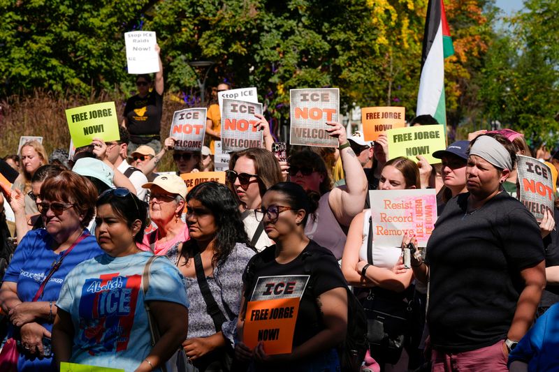 Community members rally to decry the arrest of Jorge Elieser González Ochoa on Sept. 26, 2025 on the pedestrian mall in downtown Iowa City, Iowa.