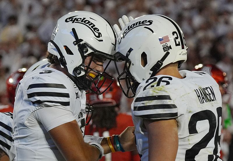 Iowa State Cyclones' quarterback Rocco Becht (3) and Iowa State Cyclones' running back Carson Hansen (26) celebrates after score a touchdown against Arizona during the third quarter in the Big-12 conference showdown on Sept. 27, 2025, at Jack Trice Stadium in Ames, Iowa.