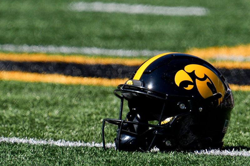 An Iowa Hawkeyes helmet lays on the field before a football game against the Indiana Hoosiers Sept. 27, 2025 at Kinnick Stadium in Iowa City, Iowa.