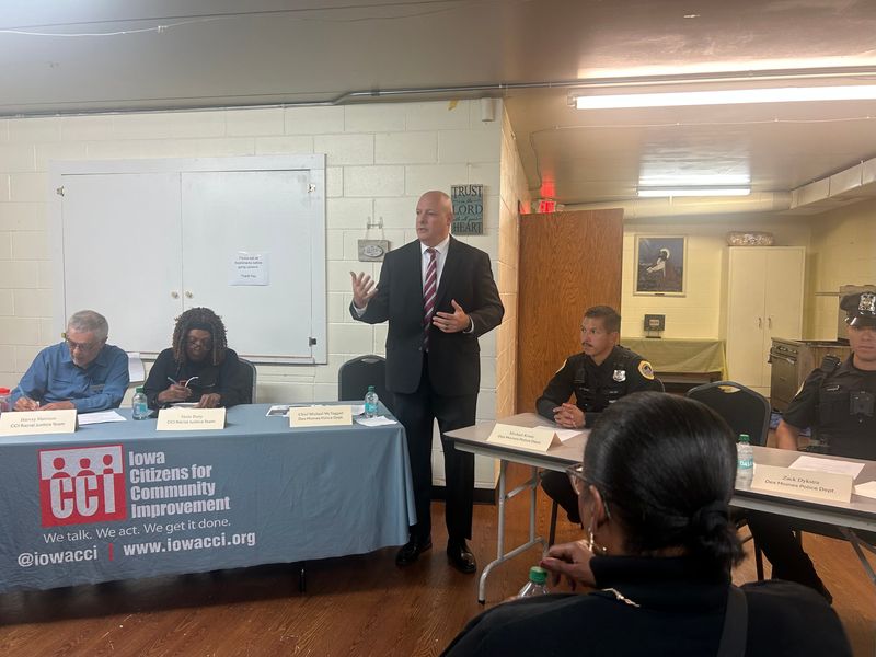 Des Moines Police Chief Michael McTaggart speaks to more than 20 residents at St. Paul AME Church in Des Moines during a community forum Tuesday, Oct. 7, held by Iowa CCI.