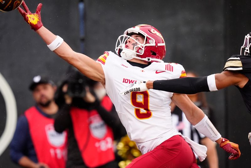 Oct 11, 2025; Boulder, Colorado, USA; Iowa State Cyclones wide receiver Brett Eskildsen (9) reaches for the football in the second quarter against the Colorado Buffaloes at Folsom Field. Mandatory Credit: Ron Chenoy-Imagn Images