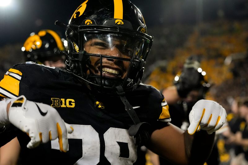 Iowa Hawkeyes running back Kamari Moulton (28) celebrates after defeating the Penn State Nittany Lions 25-24 Oct. 18, 2025 at Kinnick Stadium in Iowa City, Iowa.