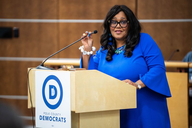 Renee Hardman speaks to the crowd as Polk County Democrats hold a nominating convention for Senate District 16 on Oct. 21, 2025, in West Des Moines.