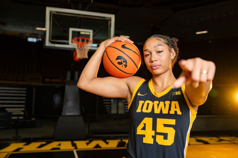 Hannah Stuelke stands for a photo during Iowa Women's Basketball media day at Carver Hawkeye arena in Iowa City, Oct. 14, 2025.