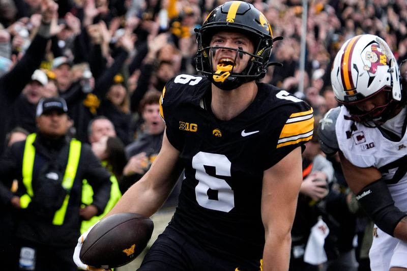 Iowa Hawkeyes defensive back Zach Lutmer (6) reacts after scoring a pick-6 against the Minnesota Golden Gophers Oct. 25, 2025 at Kinnick Stadium in Iowa City, Iowa.