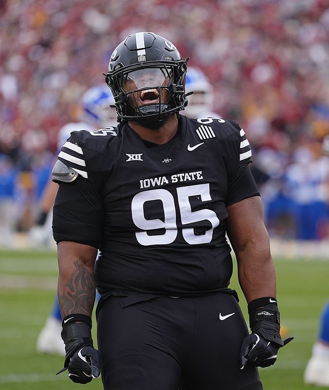 Iowa State Cyclones' defensive line Domonique Orange (95) celebrates after a stop BYU offense during the first quarter at Jack Trice Stadium on Oct. 25, 2025, in Ames, Iowa.