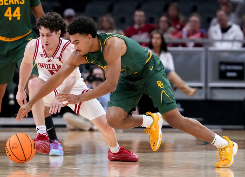 Baylor Bears guard Isaac Williams IV (10) and Indiana Hoosiers guard Conor Enright (5) chase after a loose ball during an exhibition game Sunday, Oct. 26, 2025, at Gainbridge Fieldhouse in Indianapolis. Indiana defeated Baylor 76-74.
