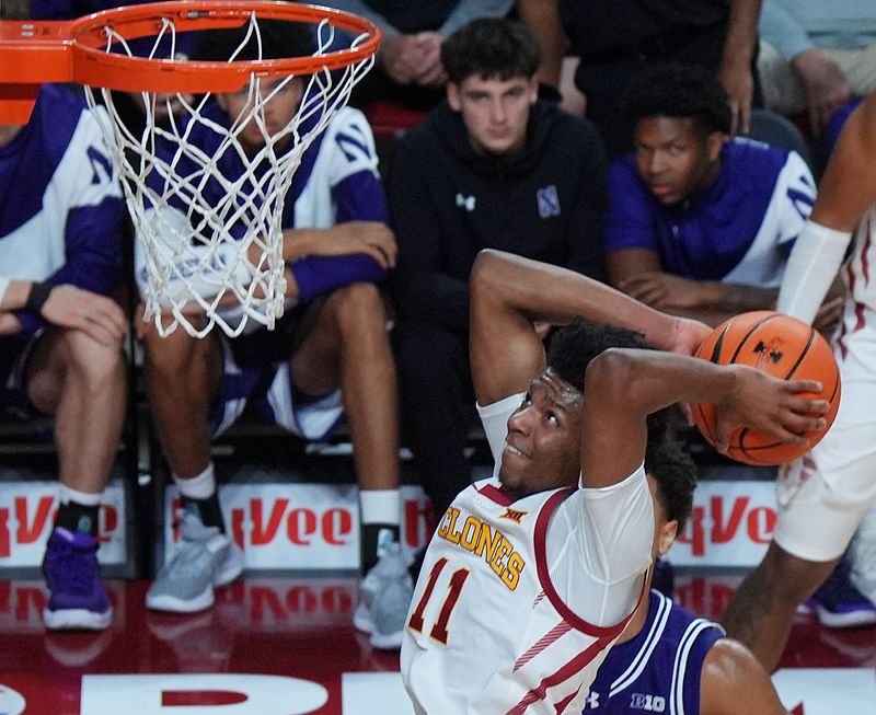 Iowa State Cyclones guard Dominick Nelson (11) goes for a dunk against Northwestern during the first half of an exhibition match at Hilton Coliseum on Oct. 26, 2025, in Ames, Iowa.