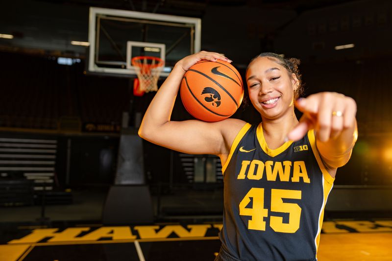 Hannah Stuelke stands for a photo during Iowa Women's Basketball media day at Carver Hawkeye arena in Iowa City, Oct. 14, 2025.
