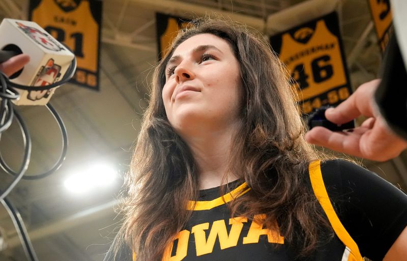 Iowaâ€™s Ava Heiden (5) answers questions from journalists during the Iowa womenâ€™s basketball media day Oct. 14, 2025 at Carver-Hawkeye Arena in Iowa City, Iowa.