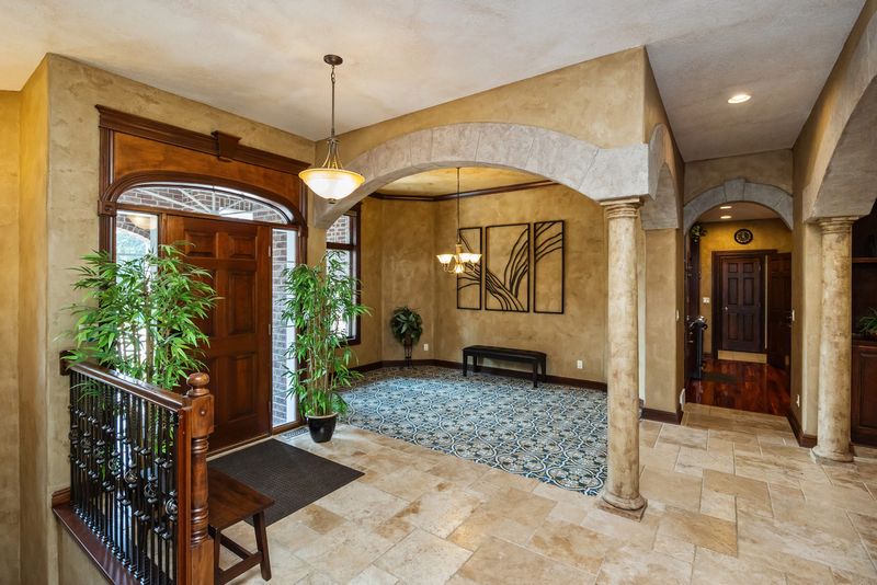 The entry foyer of 2207 SW Ridgeway Court in Ankeny shows off the Tuscan-theme of the home.