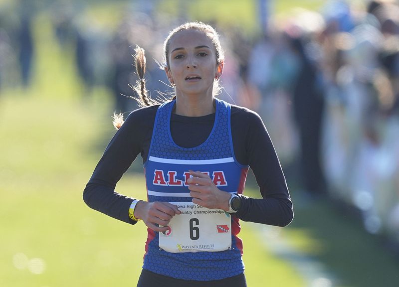Albia’s McKenna Montgomery finishes first in the 2A girls race at the state cross country meet held at the Lakeside Municipal Golf Course on Oct. 31, 2025, in Fort Dodge, Iowa.