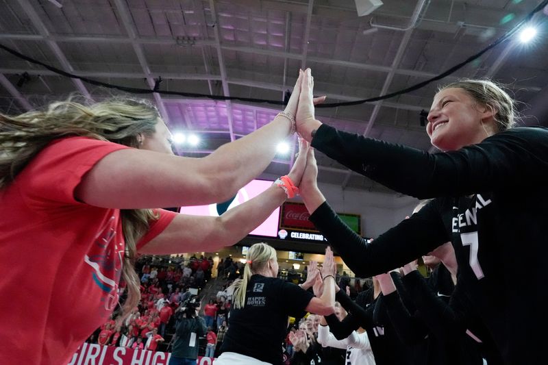 Ankeny Centennial's Tatem Schmidt (7) celebrates after defeating Iowa City West Nov. 3, 2025 during the Class 5A Iowa high school state volleyball quarterfinals at Xtream Arena in Coralville, Iowa.