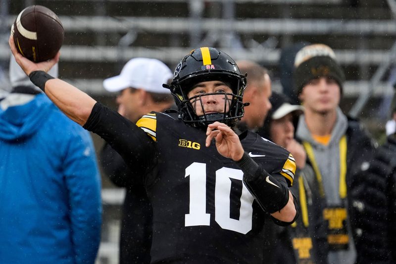 Iowa Hawkeyes quarterback Jeremy Hecklinski (10) warms up Nov. 8, 2025 before a Big Ten Football game against the Oregon Ducks at Kinnick Stadium in Iowa City, Iowa.