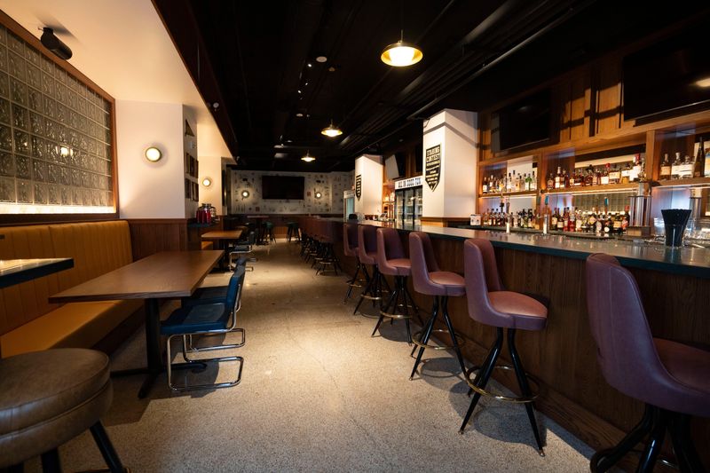 The bar and seating at Des Moines Athletic Club on Tuesday, Nov. 11, 2025, in Des Moines.