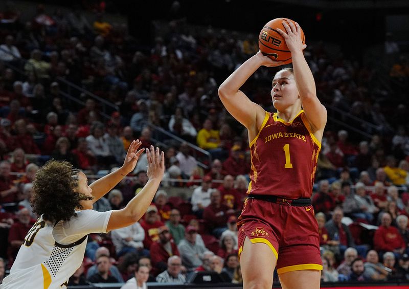 Iowa State Cyclones' guard Reese Beaty (1) shoots the ball over Valparaiso Beacons guard Mikayla Huffine (20) during the first quarter on Nov. 12, 2025, at Hilton Coliseum in Ames, Iowa.