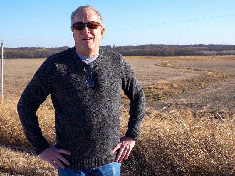 Norwalk Mayor Tom Phillips near where the city hopes to build a Buc-ee's gas station on Interstate 35.