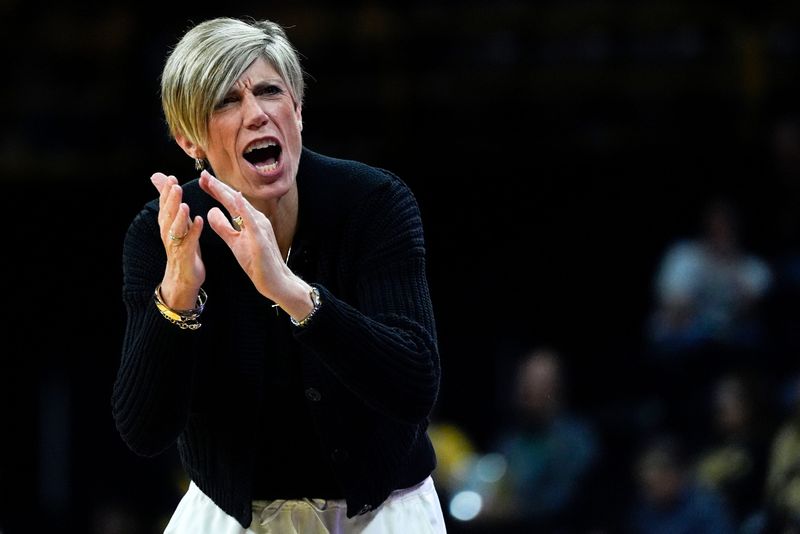 Iowa head coach Jan Jensen reacts Nov. 9, 2025 during a womenâ€™s basketball game against the Evansville Purple Aces at Carver-Hawkeye Arena in Iowa City, Iowa.