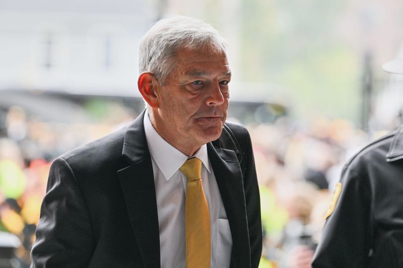 Oct 25, 2025; Iowa City, Iowa, USA; Iowa Hawkeyes head coach Kirk Ferentz arrives at Kinnick Stadium before the game against the Minnesota Golden Gophers. Mandatory Credit: Jeffrey Becker-Imagn Images