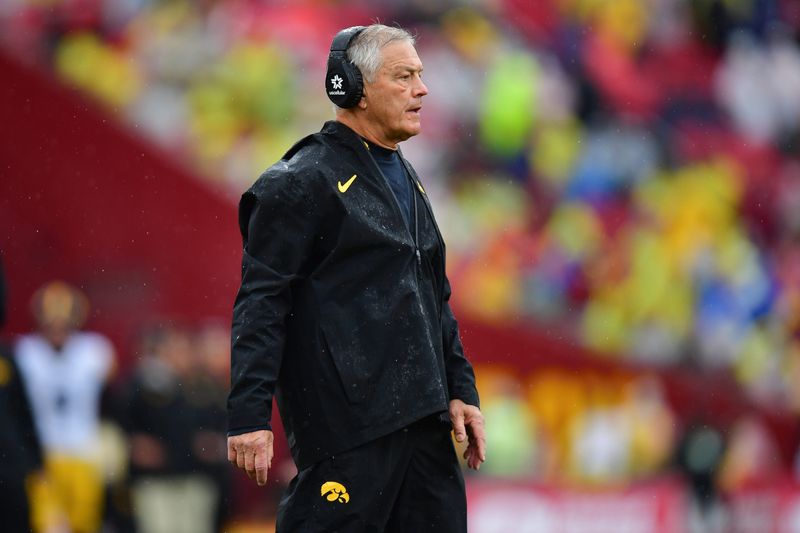 Nov 15, 2025; Los Angeles, California, USA; Iowa Hawkeyes head coach Kirk Ferentz watches game action against the Southern California Trojans during the first half at the Los Angeles Memorial Coliseum. Mandatory Credit: Gary A. Vasquez-Imagn Images