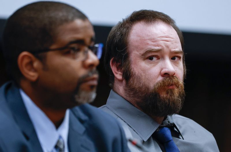 Luke Truesdell looks into the gallery as he sits with his attorney Adrian Haughton after receiving the jury's guilty verdict in his quadruple murder trail at the Linn County Courthouse in Cedar Rapids on Monday, Nov. 17, 2025.