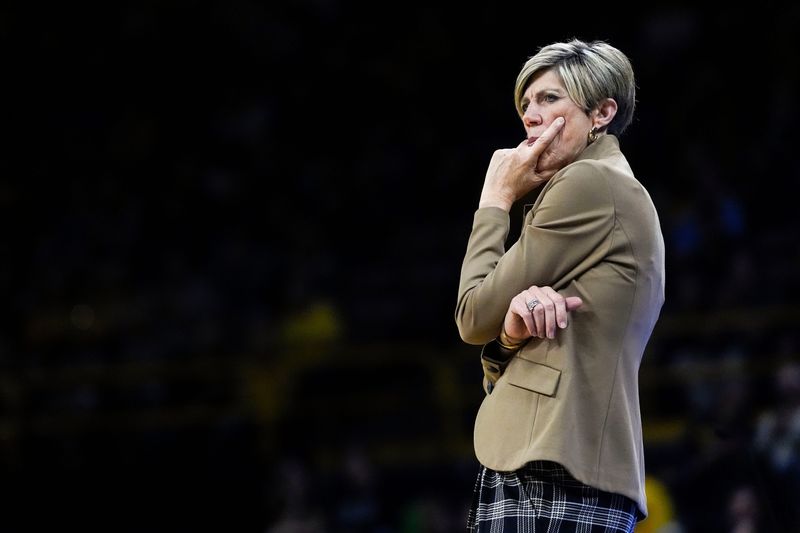 Iowa head coach Jan Jensen reacts during a basketball game against the Drake Bulldogs Nov. 13, 2025 at Carver-Hawkeye Arena in Iowa City, Iowa.