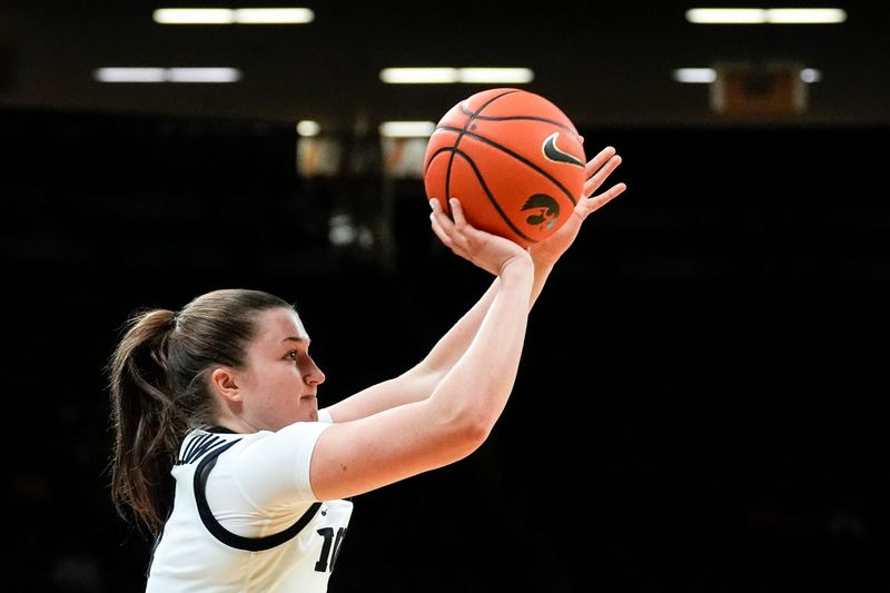 Iowa guard Taylor Stremlow (1) shoots the ball Oct. 30, 2025 during an exhibition game against the Ashland Eagles at Carver-Hawkeye Arena in Iowa City, Iowa.