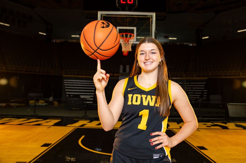 Taylor Stremlow stands for a photo during Iowa Women's Basketball media day at Carver Hawkeye arena in Iowa City, Oct. 14, 2025.