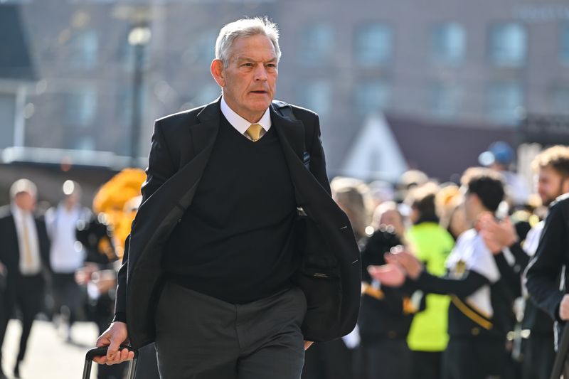 Nov 22, 2025; Iowa City, Iowa, USA; Iowa Hawkeyes head coach Kirk Ferentz enters Kinnick Stadium before the game against the Michigan State Spartans. Mandatory Credit: Jeffrey Becker-Imagn Images