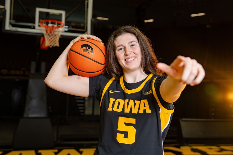 Ava Heiden stands for a photo during Iowa Women's Basketball media day at Carver Hawkeye arena in Iowa City, Oct. 14, 2025.