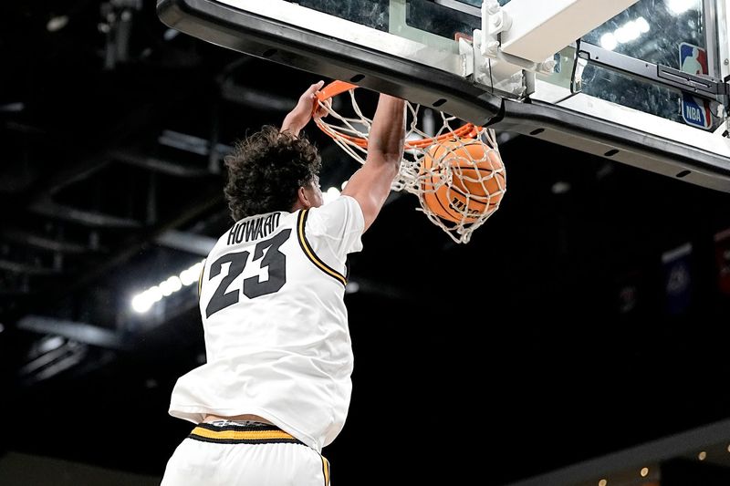 Iowa guard Isaia Howard (23) dunks against Ole Miss during the Acrisure Series at Acrisure Arena in Palm Desert, Calif., on Nov. 25, 2025.
