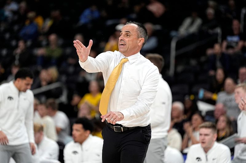Iowa head coach Ben McCullum reacts during the first half of the game against Ole Miss at Acrisure Arena in Palm Desert, Calif., on Nov. 25, 2025.