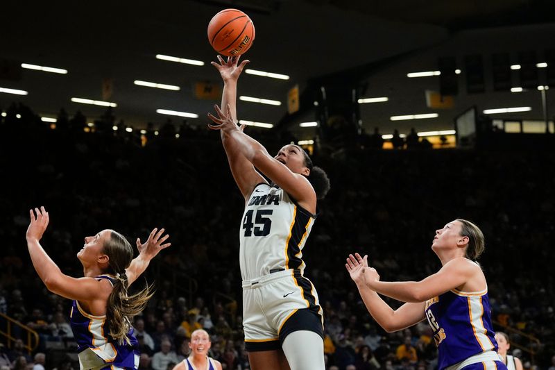 Iowa forward Hannah Stuelke (45) shoots the basketball against the Western Illinois Leathernecks Nov. 26, 2025 at Carver-Hawkeye Arena in Iowa City, Iowa.