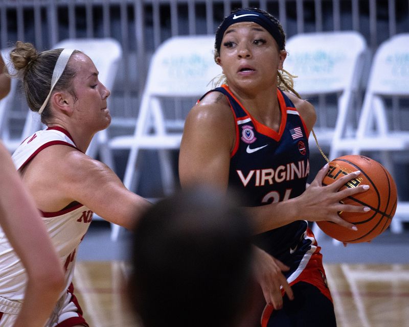 Virginia's Kymora Johnson (21) makes a play against Nebraska during the Emerald Coast Classic game at Raider Arena in Niceville, Fla., Nov. 25, 2025. Johnson was named to the 2025-26 All-ACC first team.