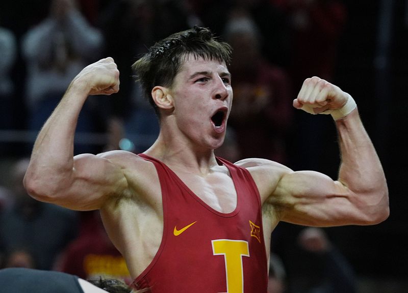 Iowa State Cyclones Evan Frost celebrates after winning over Iowa Hawkeyes Drake Ayala in their 133-pound wrestling of the Cy-Hawk Series on Nov. 30, 2025 at Hilton Coliseum in Ames, Iowa.