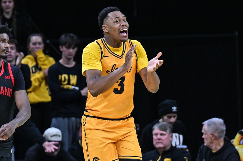 Dec 6, 2025; Iowa City, Iowa, USA; Iowa Hawkeyes forward Cam Manyawu (3) reacts during the second half against the Maryland Terrapins at Carver-Hawkeye Arena. Mandatory Credit: Jeffrey Becker-Imagn Images