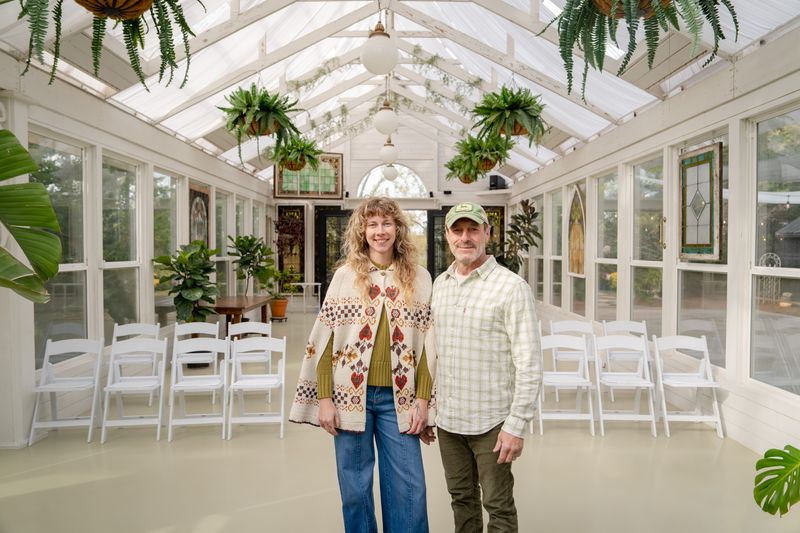 Raelyn and Earl Ramey stand at Iris Aisle near Winterset, Oct. 24, 2025.