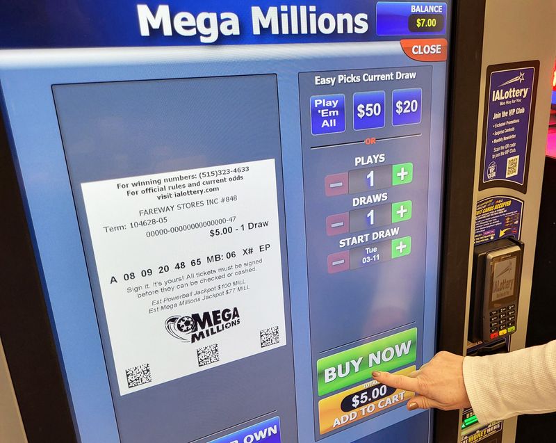 A Mega Millions ticket is sold at an Iowa Lottery kiosk inside a Fareway store.