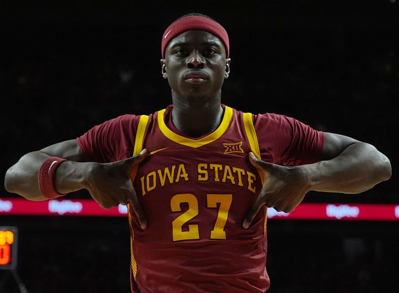 Iowa State Cyclones forward Killyan Toure (27) celebrates after a dunk against Iowa during the second half in the men’s basketball Cy-Hawk series on Dec. 11, 2025, in Ames, Iowa.