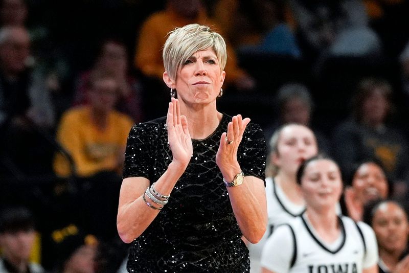 Iowa head coach Jan Jensen reacts during a basketball game against the Lindenwood Lions Dec. 13, 2025 at Carver-Hawkeye Arena in Iowa City, Iowa.