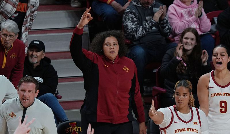 Iowa State Cyclones' center Audi Crooks (55) cheers from the bench during the second quarter against Northern Iowa on December 14, 2025, at Hilton Coliseum in Ames, Iowa.