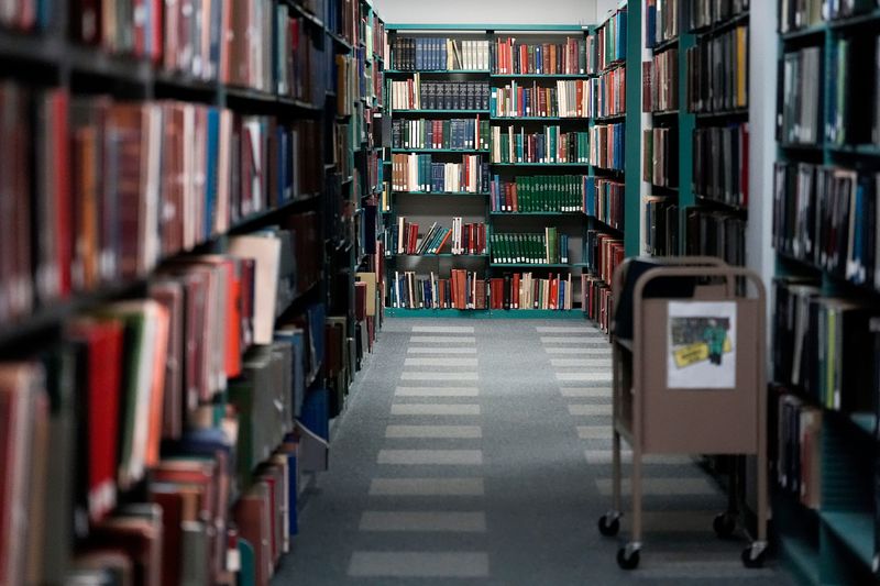 Shelves of books are pictured at the State Historical Society Centennial Building during its last day of operation Dec. 31, 2025 in Iowa City, Iowa.