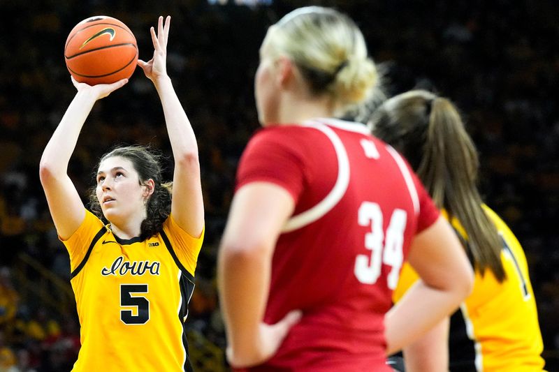 Iowa center Ava Heiden (5) shoots a free throw against the Nebraska Cornhuskers on Jan. 1, 2026, at Carver-Hawkeye Arena in Iowa City, Iowa.