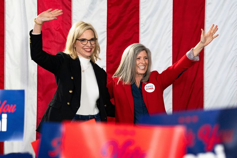 U.S. Sen. Joni Ernst, right, and U.S. Rep. Ashley Hinson greet the crowd during a Hinson campaign event on Saturday, Jan. 10, 2026 in Adel.