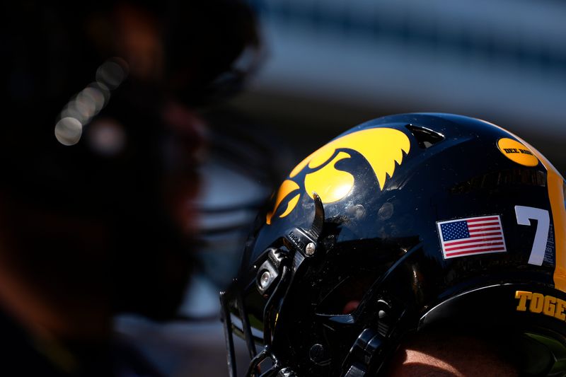 The Iowa Hawkeyes logo is pictured on a helmet during warmups before a football game against the Indiana Hoosiers Sept. 27, 2025 at Kinnick Stadium in Iowa City, Iowa.