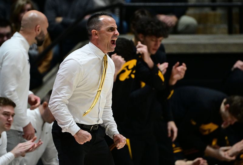 Jan 14, 2026; West Lafayette, Indiana, USA; Iowa Hawkeyes head coach Ben McCollum reacts to a call during the first half against the Purdue Boilermakers at Mackey Arena. Mandatory Credit: Marc Lebryk-Imagn Images