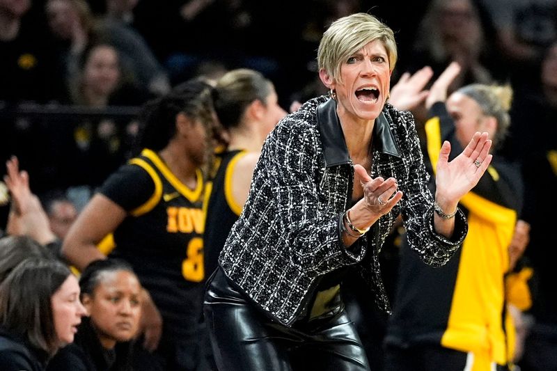 Iowa head coach Jan Jensen reacts during a basketball game against the Oregon Ducks Jan. 15, 2026 at Carver-Hawkeye Arena in Iowa City, Iowa.