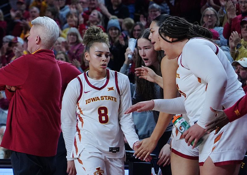Iowa State Cyclones' guard Jada Williams (8) gets congratulation from forward Addy Brown (24), enter/forward Lilly Taulelei (9) and center Audi Crooks (55) after scoring 44 against Cincinnati Bearcats in the Big-12 women’s basketball on Jan. 21, 2026, at Hilton Coliseum in Ames, Iowa.